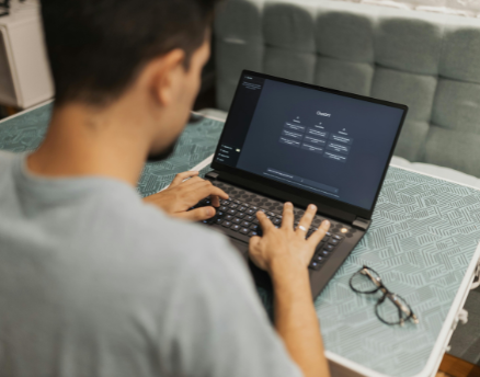 Man using AI in HR with ChatGPT on computer